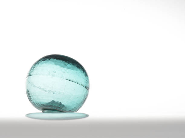 istock Glass ball on a white background 641543114