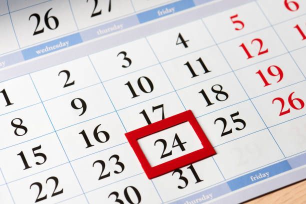 istock Date highlighted in red on calendar with black numbers 641544236