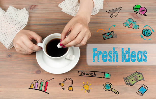 istock Fresh Ideas. Coffee cup top view on wooden table background 641545344