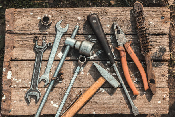 istock On weathered old wooden surface lie the tools 641546658
