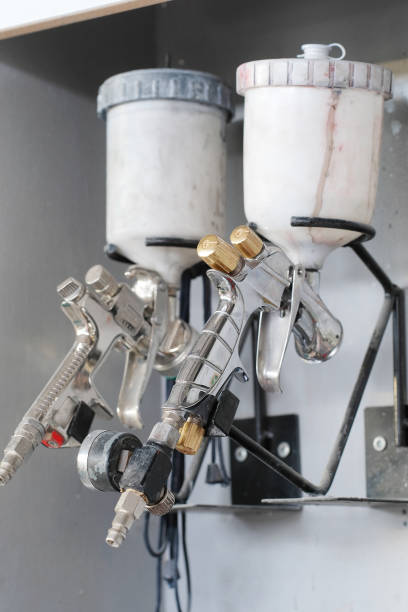 istock dirty spray guns 	suspend on a wall 641547746