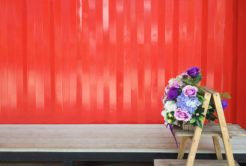 Modern home and shop design with flowers on reclaimed wood decoration, containerization background