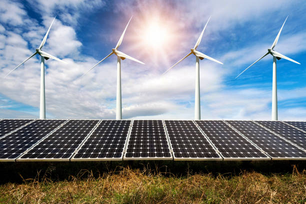 istock Photo collage of solar panels and wind turbins 641556584