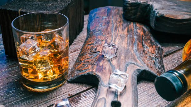 istock Whiskey on dark wood 641558748