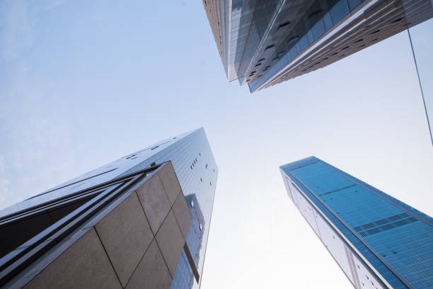istock Looking up at business buildings 641559274