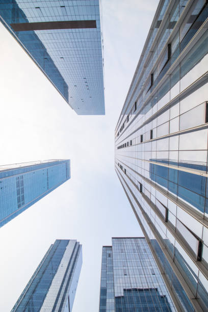 istock Looking up at business buildings 641559762