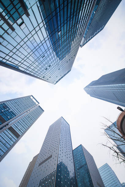 istock Looking up at business buildings 641560572