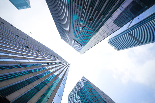 istock Looking up at business buildings 641561530