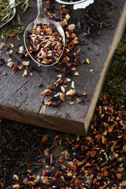 istock Tea in the background of dark wood 641563676