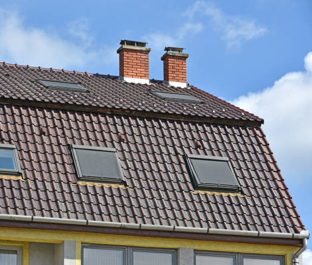 istock Large house roof with smoke stacks 641564438