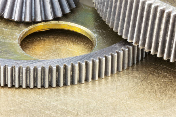 istock metal machine gears and cogwheels on scratched background 641569630