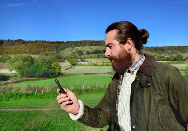 istock Young adult and one mobile phone, fall clothes 641570316