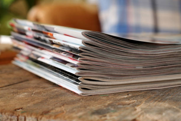 istock Magazines on the wooden table 641571168