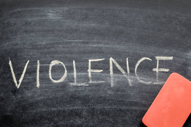 erasing violence, hand written word on blackboard being erased concept erasing violence, hand written word on blackboard being erased concept board eraser photos stock pictures, royalty-free photos & images