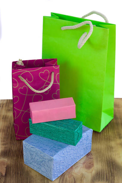 istock Colorful and bright shopping packages and boxes on wooden table 641578254