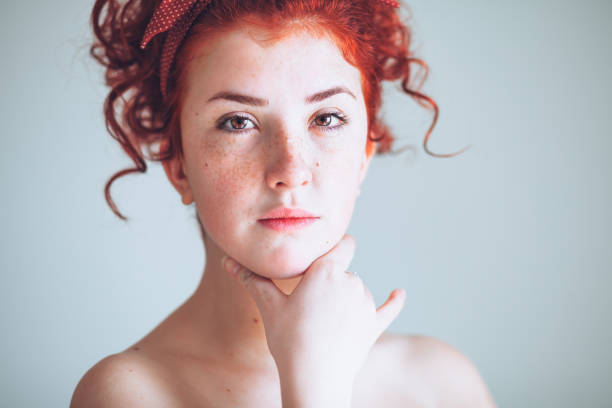 Beautiful young redhead woman