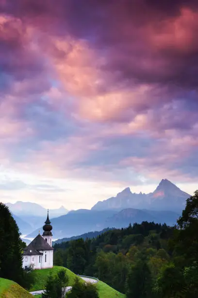 The pilgrimage church Maria-Gern in Berchtesgaden. In the background the Watzmann and fog on the Königssee.