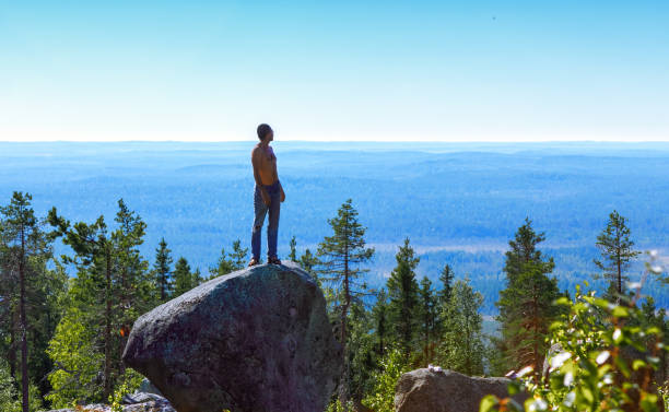 istock Man On Top Of The Mountain 641581992