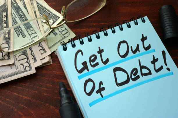 istock Get out of Debt written on a notepad with marker. 641582568