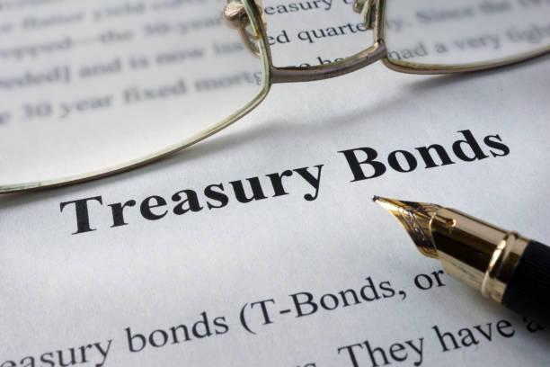 istock Page of newspaper with words treasury bonds. 641583078