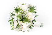 Ivory and green wedding bouquet of roses and freesia flowers