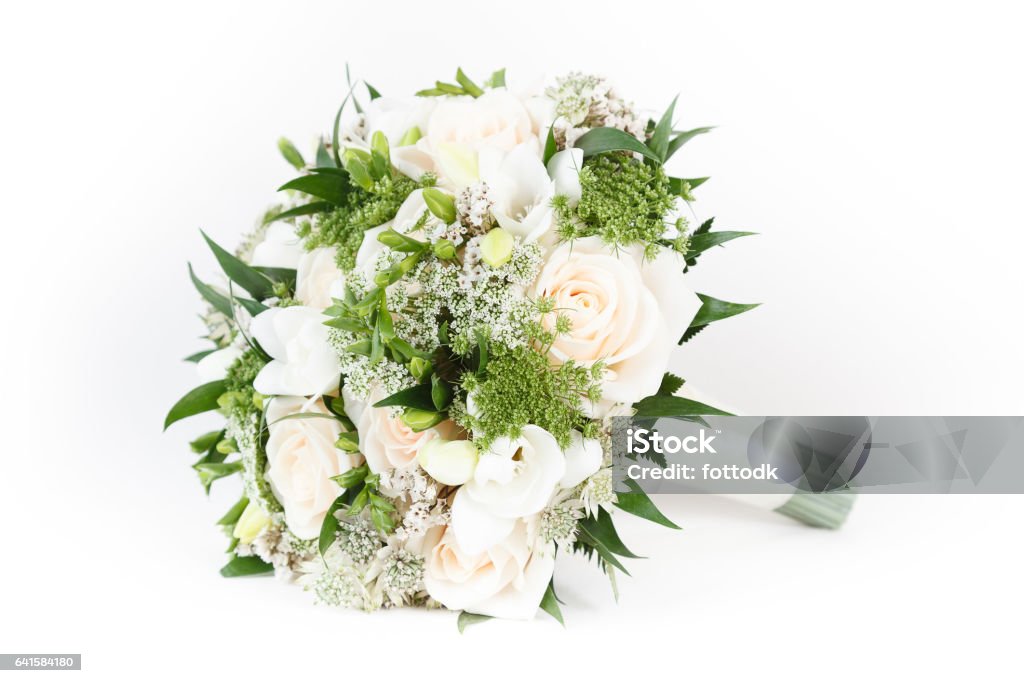 Ivory and green wedding bouquet of roses and freesia flowers Bouquet Stock Photo