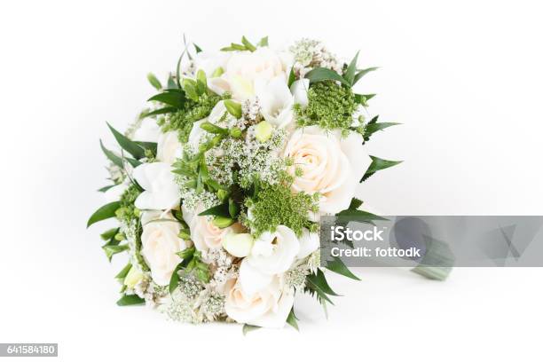 Ivory And Green Wedding Bouquet Of Roses And Freesia Flowers Stock Photo - Download Image Now