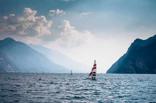 Yachts on beautiful Garda lake, Italy. Vacation background