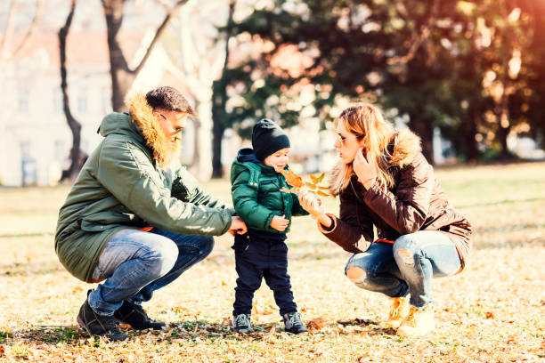 istock Happy Family In The Park 641588884