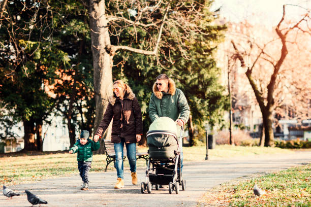 istock Happy Family walking In The Park 641589486