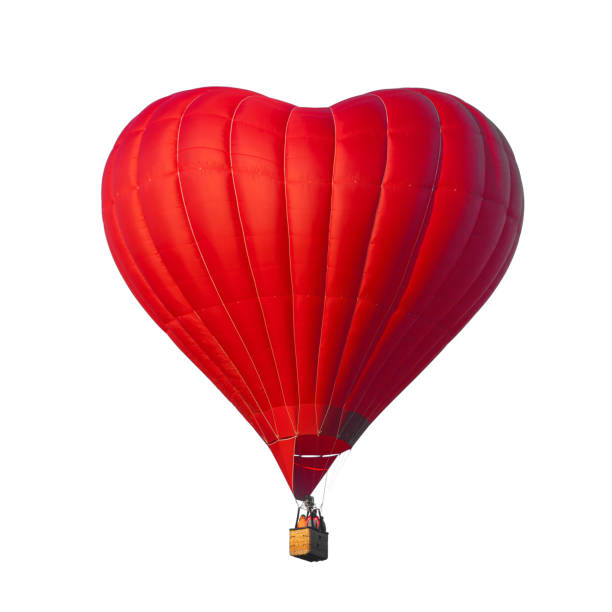 roter luftballon in form eines herzens isoliert auf weißem hintergrund - heart balloon stock-fotos und bilder