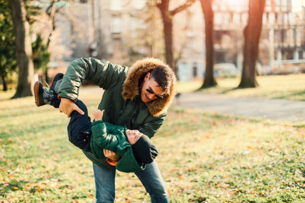 istock Father and His Son In The Park. 641590330