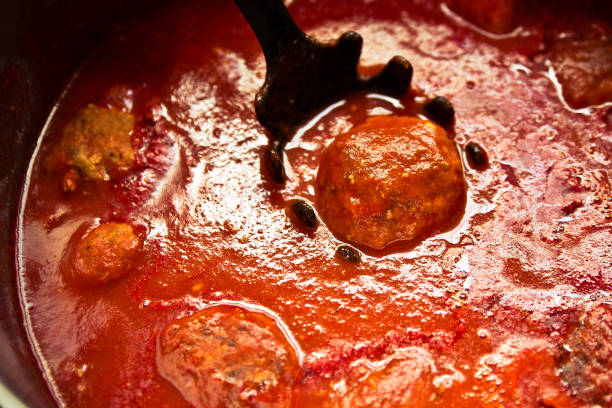 Pot of authentic traditional Italian tomato sauce and meatballs