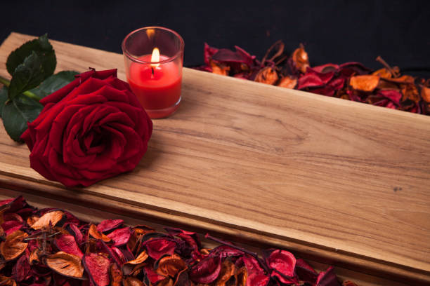 Rose and red candle stock photo