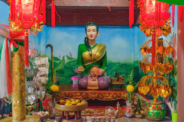 istock Burning red incense sticks in small Chinese temple 641596580