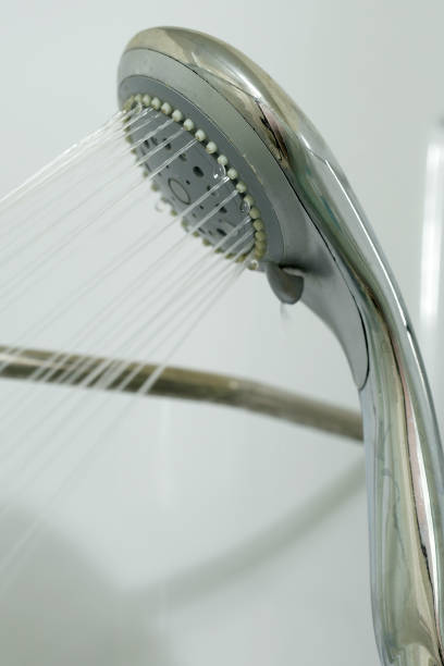 istock stream of water flows from a shower 641599008