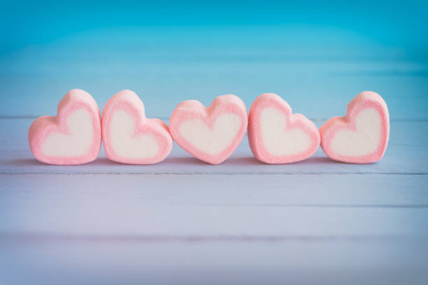 istock Pink heart shape marshmallow for love theme and Valentine background 641606296