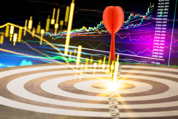 istock Arrows on dart board with stock market graph background mean 641609674