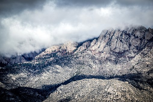 Sandia Mountains in New Mexico covered with light snow