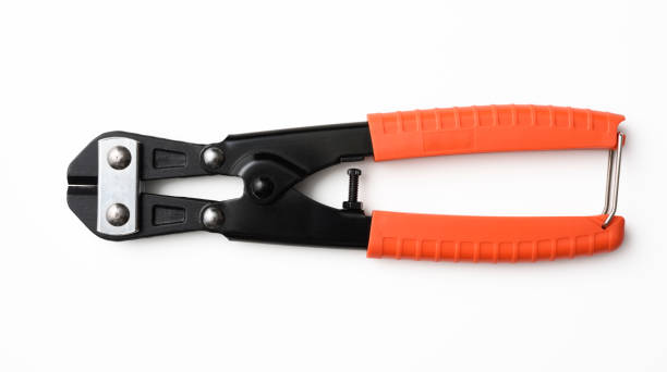 Isolated shot of closed new bolt cutters on white background Closed new bolt cutters isolated on white background with clipping path. bolt cutter stock pictures, royalty-free photos & images