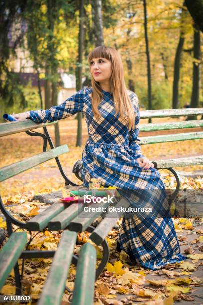 Beautiful Girl In Park Autumn Stock Photo - Download Image Now - Adult, Adults Only, Autumn