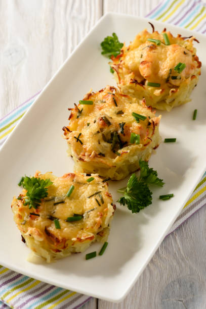 istock Appetizer - potato muffins with chicken meat and cheese. 641623344