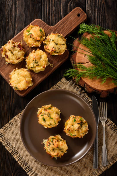 istock Appetizer - potato muffins with chicken meat and cheese. 641623372