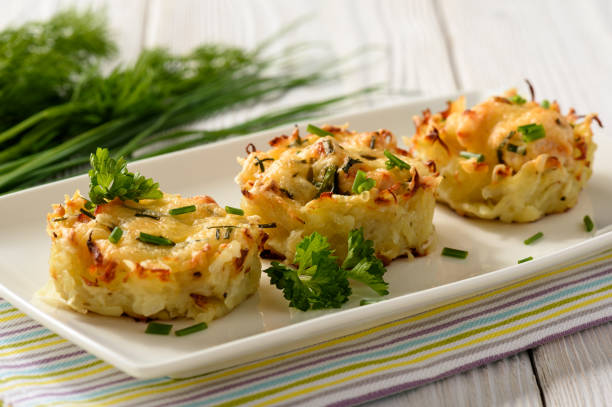 istock Appetizer - potato muffins with chicken meat and cheese. 641623420