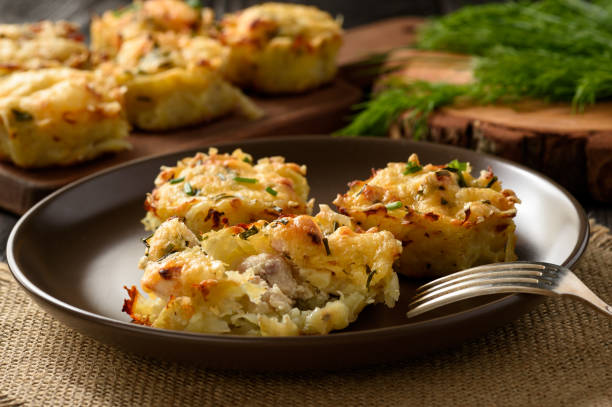 istock Appetizer - potato muffins with chicken meat and cheese. 641623562