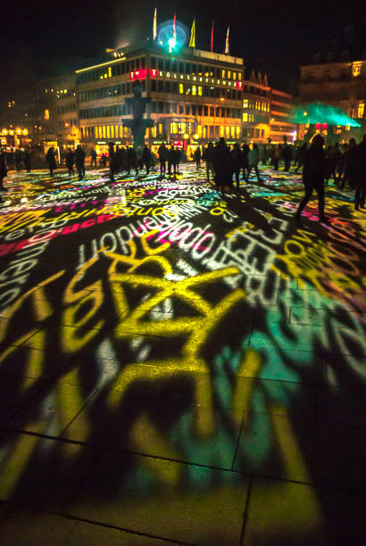 Cologne, Germany - January 16, 2017: Light installation around the cologne cathedral, spectators standing on the square, looking at the projections