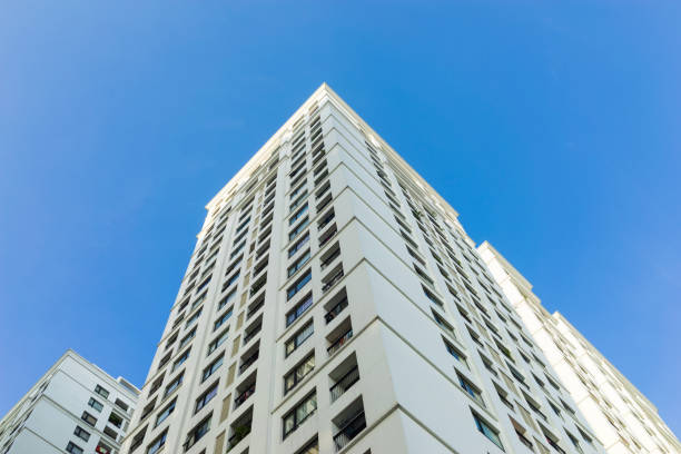 istock Resident apartment buildings against blue sky 641628382