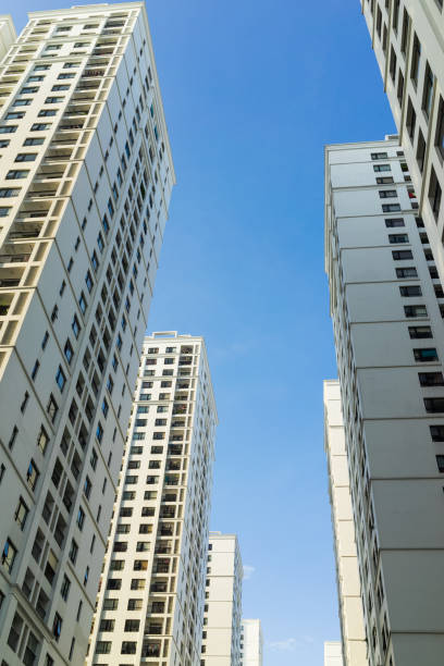 istock Resident apartment buildings against blue sky 641628582