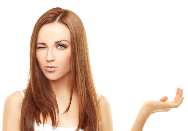 istock Girl showing empty copy space on the open hand palm. Presenting Something 641629018