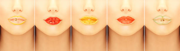 Woman's mouths with fruity lip gloss